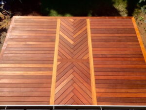 Composite deck with modern design and durable material for outdoor living spaces.