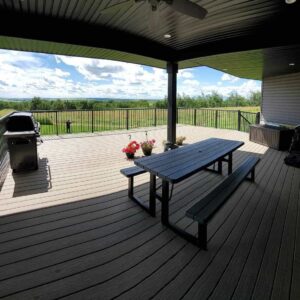 Low-maintenance composite decking installed in a backyard in Edmonton by CBS Alberta
